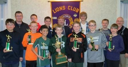The Butter Creek-sponsored team won the Pennridge Little League Major Division title in 2013 and was honored by the Perkasie Lions Club for the achievement. Team members include (front row, from left) Nate Jenson, Joey Mossbrook, John Polachek, Jared Forscht, Joey Smith, Carter Heller and Gavin Konschak. In the second row are coach Tom Forscht, Zach Fluck, C.J. Deiley, Perkasie Lions Club president J.R. Hunsberger, Cole Miklos, Zach Artman and coach Craig Smith. Coach Chris Heller is missing from the photo.