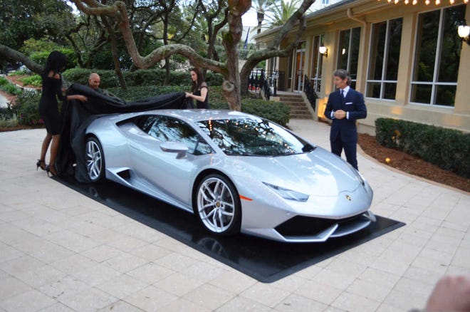 Dan.Scanlan@jacksonville.com Lamborghini President and CEO Stephan Winkelmann watches the unveiling of the 2015 Huracán (Spanish for hurricane) LP 610-4 on March 7 at the Golf Club of Amelia Island.