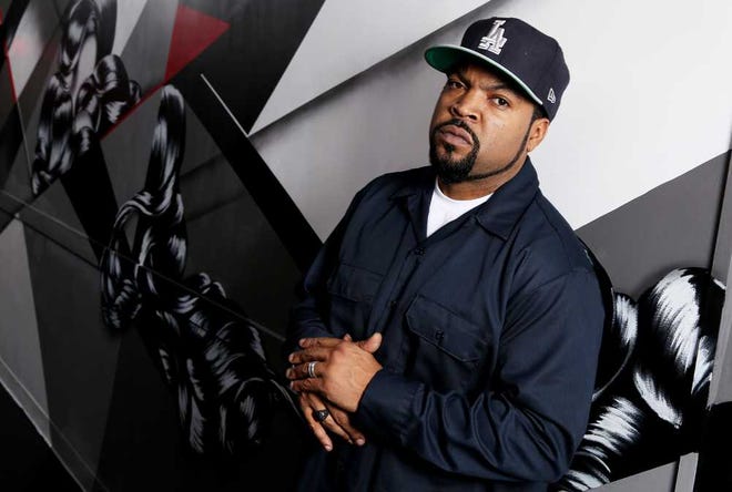 In this Tuesday, Feb. 11, 2014 photo, Ice Cube poses for a portrait in Los Angeles. Ice Cube co-starred with Kevin Hart in the film, "Ride Along," which has made over $134.6 million worldwide. (Photo by Matt Sayles/Invision/AP)