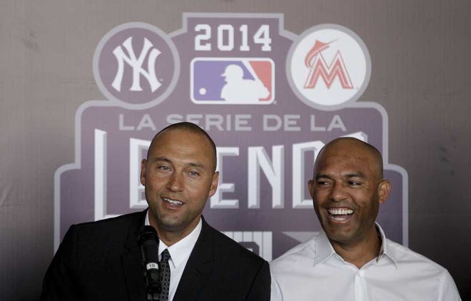 New York Yankees captain Derek Jeter, left, and retired baseball pitcher Mariano Rivera, smile during a press conference in Panama City, Saturday, March 15, 2014. The New York Yankees are in Panama to play a pair of exhibition games against the Miami Marlins in the home country of Rivera, the retired career saves leader. Part of the Legend Series, the Saturday and Sunday games at the Rod Carew Stadium highlight a weekend that is a tribute to Rivera, who retired after last season. (AP Photo/Arnulfo Franco)