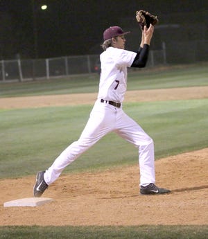 Seth Owen steps on first base to record a force out after running over from the mound during the Brownwood Lions’ 7-2 loss to No. 10 Liberty Hill.