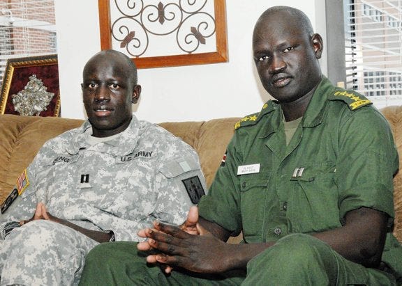 Patrick Buffett
Captains Gabriel Deng, U.S. Army, and Memer Peter Magot, Sudan People's Liberation Army, pose for a photo in the International Student Program lounge at Fort Lee's Army Logisitics University.
