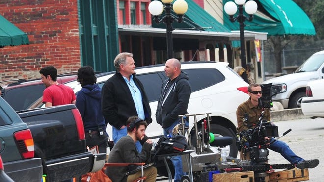 The crew of “Lost in the Sun” shoots scenes in downtown Smithville in early March. A producer said Smithville was chosen for shooting because of its “small-town charm.”