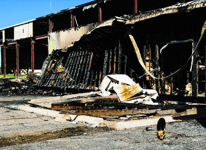 The area that burned Tuesday was the last portion of the empty Aurora Street warehouse still “semi-standing” after vagrants and metal thieves stripped most of the site's metal for scrap.