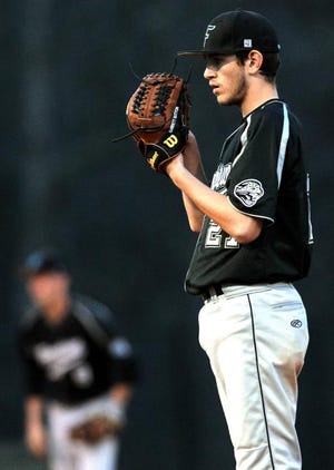 Forestview pitcher Garrett Sutton looks in for the sign during Friday's game at North Gaston.