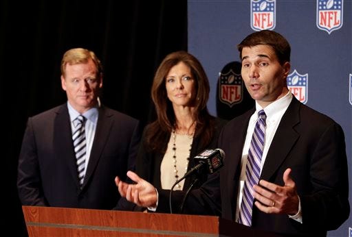 Scott Hallenbeck, right, USA Football's executive director speaks as NFL Commissioner Roger Goodell, left, and NFL Foundation Chair Charlotte Jones Anderson, center, listen during a news conference at the NFL football annual meeting in Orlando, Fla., Monday. The NFL Foundation is giving USA Football a five-year, $45 million grant to expand the already burgeoning Heads Up Football program that teaches safe tackling to youngsters.