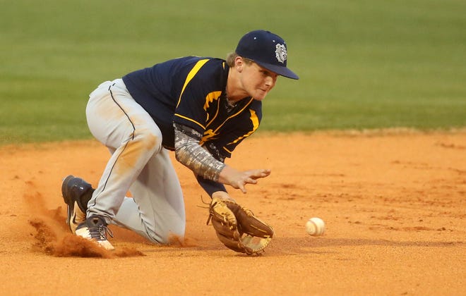Burns shortstop Russ Branch scoops up a ground ball in Friday's 4-0 victory at Shelby.