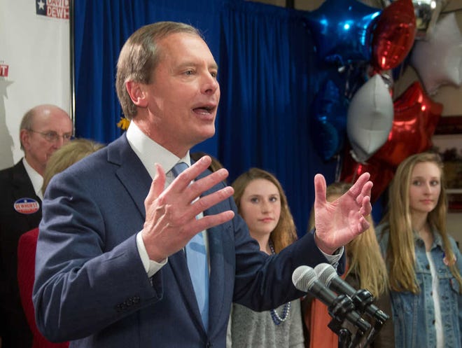 Texas Lt. Gov. David Dewhurst talks to supporters and the media after a runoff was predicted against Republican primary challenger Dan Patrick in Houston, Tuesday, March 4, 2014. (AP Photo/Richard Carson)
