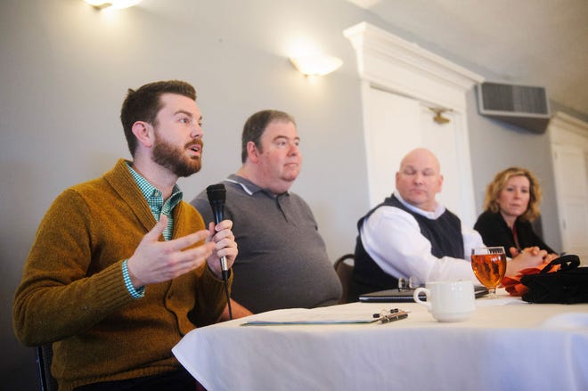From left, Jonathan Sessions, Paul Cushing, Joseph Toepke and Helen Wade answer questions from the audience during a forum for candidates running for the Columbia Board of Education. The forum was hosted by the Boone County Democrats Muleskinners at the Columbia Country Club.