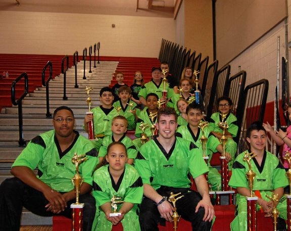 contributed PHOTO
Twelve Competitors from Kickstars Martial Arts, in Colonial Heights, brought home seven 1st Place trophies, from the "Petersburg Karate Open". The Kickstars School won a total of 20 trophies at the one day competition event, held at Matoaca High School, Mar. 15th.