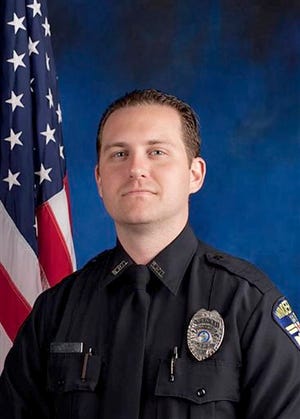 In this undated photo provided by the Windermere Police Department, Windermere, Fla., Police Department Officer Robert German is shown. German was shot and killed early Saturday March 22, 2014, after stopping two people and calling for help in an Orlando suburb, authorities said. (AP Photo/Windermere Police Department)