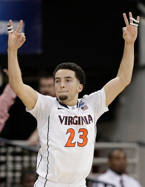 Virginia's London Perrantes reacts to a 3-point shot during Sunday night's victory against Memphis.