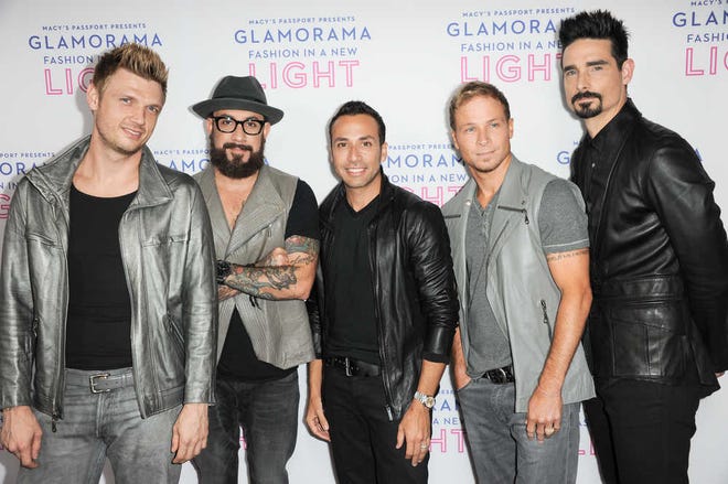 From left, Nick Carter, AJ McLean, Howie Dorough, Brian Littrell, and Kevin Richardson of The Backstreet Boys arrive at the Macy's Passport's Glamorama at The Orpheum Theatre on thursday, Sept. 12, 2013 in Los Angeles. (Photo by Richard Shotwell/Invision/AP)