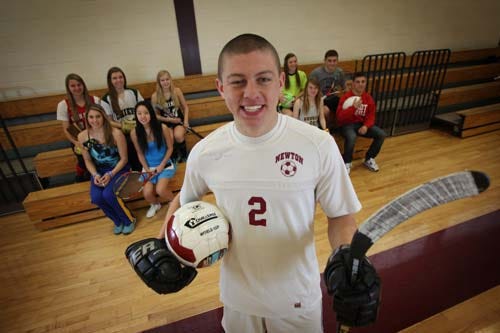 Photo by Daniel Freel/New Jersey Herald — Brett Conrads, of Newton High, is one of 10 local students chosen to represent his or her school in this year’s United Way Scholar Athlete Program. The three-sport standout is flanked by the nine other athletes.