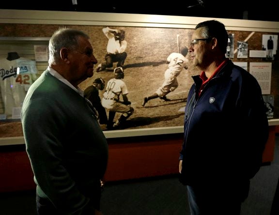 ap photo
Former Atlanta Braves former pitcher Greg Maddux, left, and former manager Bobby Cox walk through a locker room exhibit during their orientation visit at the Baseball Hall of Fame on Monday in Cooperstown, N.Y. They will be inducted to the hall in July.