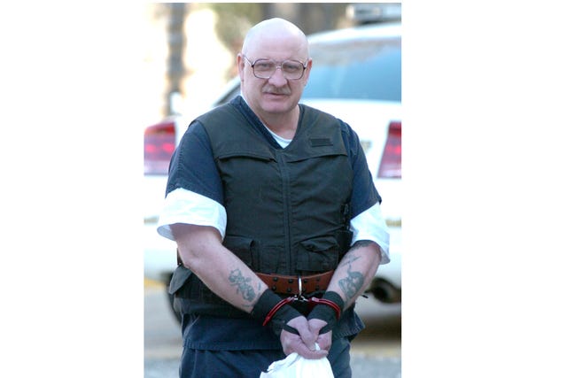 TIMES RECORD FILE PHOTO / Rickey Dale Newman, convicted of murder and sentenced to death, arrives at the Crawford County Courthouse in Van Buren in March 2011 for a hearing.