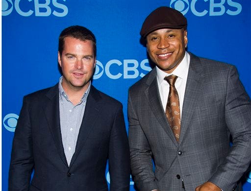 This May 15, 2013 file photo shows Chris O' Donnell, left, and LL Cool J attending the CBS Upfront in New York. The pair will co-host the Academy of Country Music's annual television special "ACM Presents: An All-Star Salute to the Troops" that will air on May 20 on CBS. (Photo by Charles Sykes/Invision/AP, File)