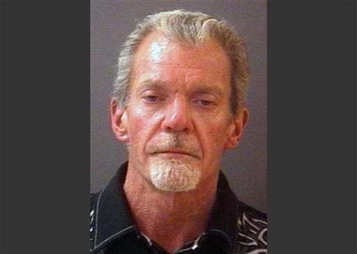 This file mug shot provided by the Hamilton County Sheriff's Department shows Indianapolis Colts owner Jim Irsay after he was arrested Sunday night, March 16, 2014. Police say Irsay had $29,000 in cash with him when he was arrested last week on suspicion of intoxicated driving. The Indianapolis Star reports it obtained the Carmel police documents on Irsay's March 16 arrest through a public records request.