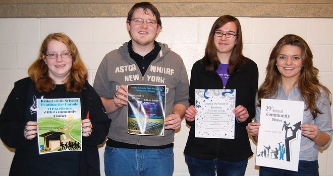 Shown are Jessica Barker, Thomas Plett, Nadine Rewa and Jordan Stephens displaying posters for the 29th Annual Community Dinner. Students in Danna Fuller's art class at Ionia High School created works of art for the community dinner Tuesday.