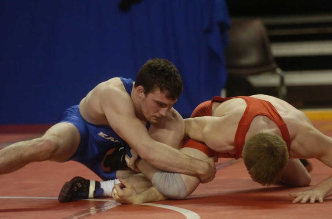Rossville's Tagen Lambotte, left, works for a takedown of Fredonia's Brogan Humphrey during their match at Friday's Kansas Senior Classic at the Kansas Expocentre. Lambotte won the battle of four-time state champions, beating Humphrey 7-3.