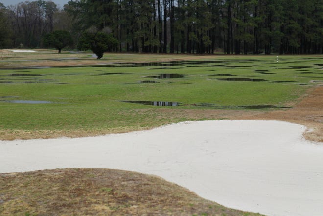 Heavy rains Saturday forced the postponement of the second round of the Intercollegiate Golf Championship at Paradise Point Golf Course aboard Camp Lejeune.