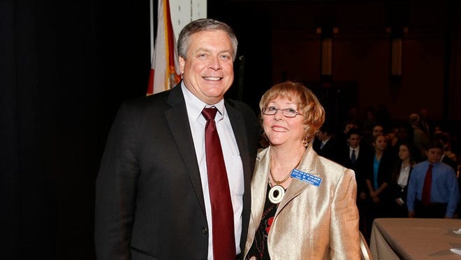 Joyce Russell (right) with Pastor Kent at Forum Club luncheon.