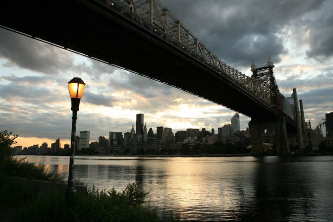 On this date in 1909,the Queensboro Bridge, linking the New York City boroughs of Manhattan and Queens, opened. Above, the bridge is shown in September 2008.