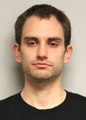 Timothy Barker, 21, now residing at the Brewster Street rooming house, is charged with attempted burglary.
