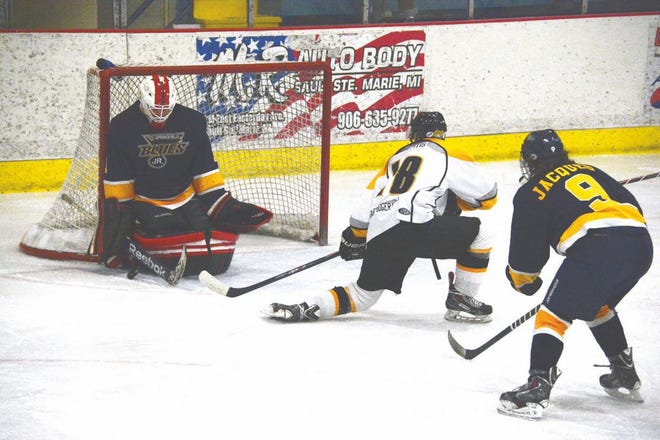 Bruno Birzitis (18) of the Soo Eagles puts a shot on the Springfield net during Saturday night’s game at Pullar Stadim.