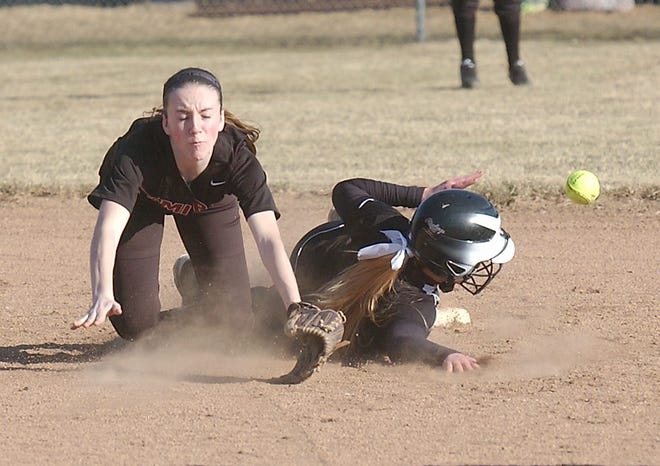 Corning's Riley Gonta safely steals second as Elmira shortstop Emily Saltsman can't get to the throw. Eric Wensel/The Leader