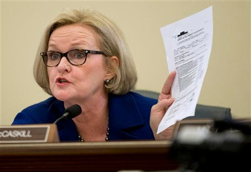 Sen. Claire McCaskill, D-Mo., holds up a document Wednesday as she questions General Motors CEO Mary Barra during a Senate subcommittee hearing.