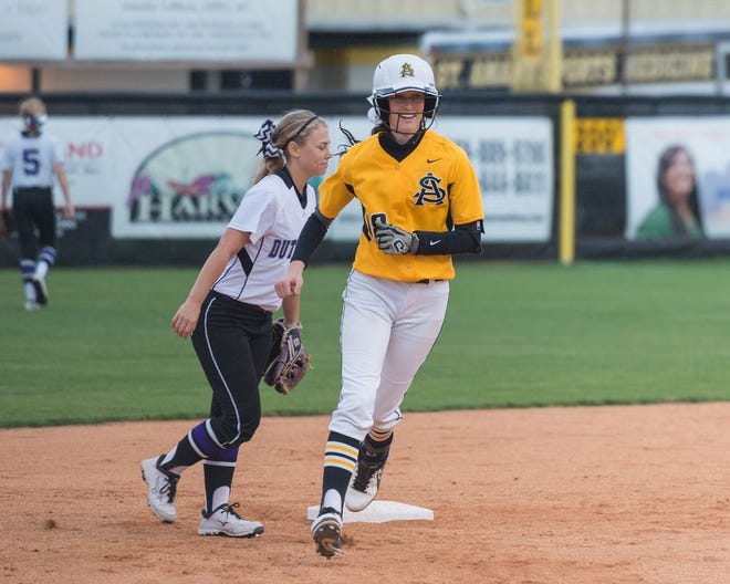 St. Amant's Jordan Hartman rounds the bases after a home run in the Lady Gators' 13-4 win over Dutchtown. Photo by Dewey Keller.
