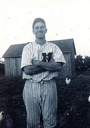 Louis Reinhart is seen here in his high school uniform at Villa Grove. On Friday, Reinhart, now 100, is slated to deliver the ceremonial first ball as part of Wrigley Field's 100-year-anniversary celebration.