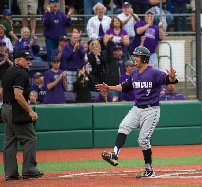 Kansas State All-American Ross Kivett, shown here scoring a run against Bryant during the 2013 NCAA regionals, has moved to center field after playing second base a year ago. "Whatever it takes for the team to win," Kivett said of the switch.