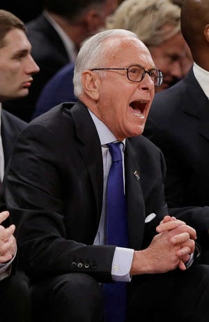 SMU coach Larry Brown barks instructions at his team Thursday in the NIT title game against Minnesota. SMU lost, 65-63.