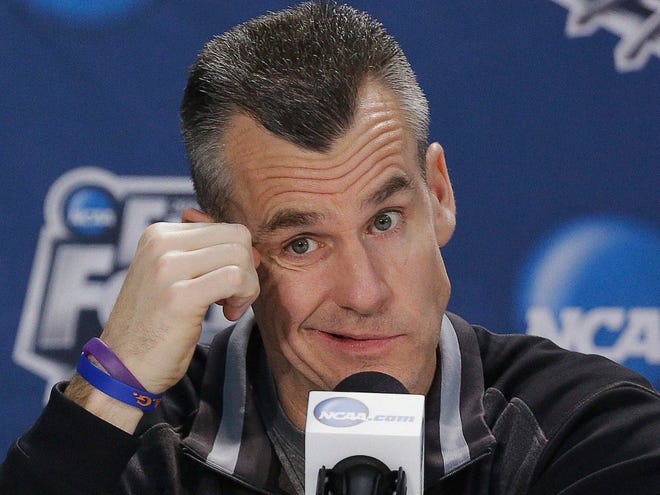 Florida head coach Billy Donovan ponders a question during a news conference for the Final Four on Thursday in Dallas. (AP Photo/David J. Phillip)