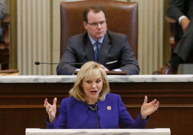ASSOCIATED PRESS FILE PHOTO / Oklahoma Gov. Mary Fallin gestures as she gives her State of the State address in Oklahoma City on Feb. 3. Behind her is Lt. Gov. Todd Lamb.