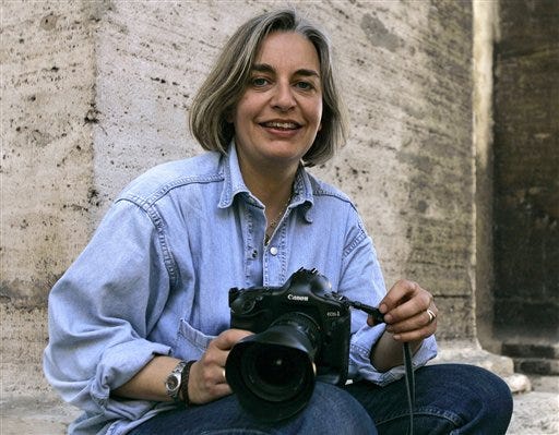 Associated Press photographer Anja Niedringhaus poses for a photograph in Rome in 2005. Niedringhaus, 48, was killed and an AP reporter was wounded on Friday, April 4, 2014 when an Afghan policeman opened fire while they were sitting in their car in eastern Afghanistan.