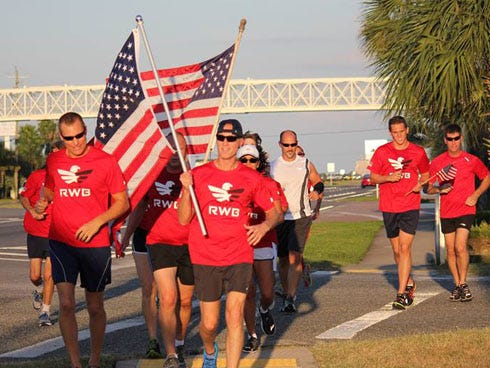 Local Team Red, White & Blue members run through Fort Walton Beach and on Okaloosa Island on Sept. 11, 2013. The group will be holding a similar run on April 12 in remembrance of Clay Hunt, a Marines veteran who committed suicide after returning from several deployments to Iraq and Afghanistan.