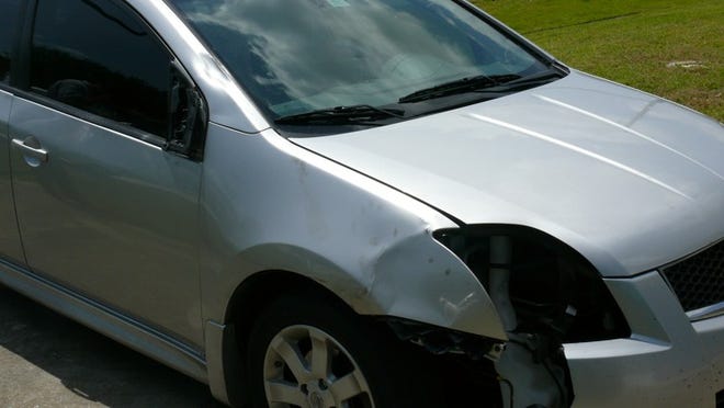 Silver 2012 Nissan Sentra suspected in hit and run.