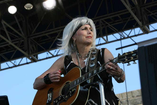 Emmylou Harris performs at the Newport Folk Festival in 2011.