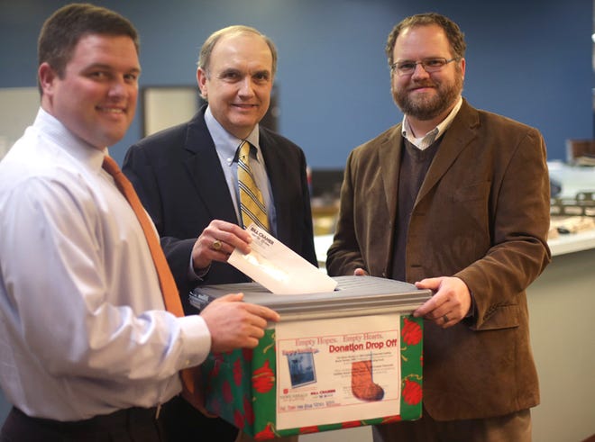 Heather Leiphart | The News Herald


Bill Cramer, center, drops off the last donation to the Empty Stocking Fund Wednesday at the News Herald office with his sons Chris, left, and Will.