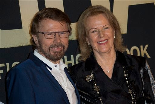 Swedish singer's Bjorn Ulvaeus, left, and Anni-Frid Lyngstad, of the pop group ABBA, pose on the red carpet ahead of the band's International anniversary party at the Tate Modern in central London, Monday, April 7, 2014. The event marks the launch of ABBA - The Official Photo Book, the first ever authorised photographic biography of the band. (Photo by Joel Ryan/Invision/AP Images)
