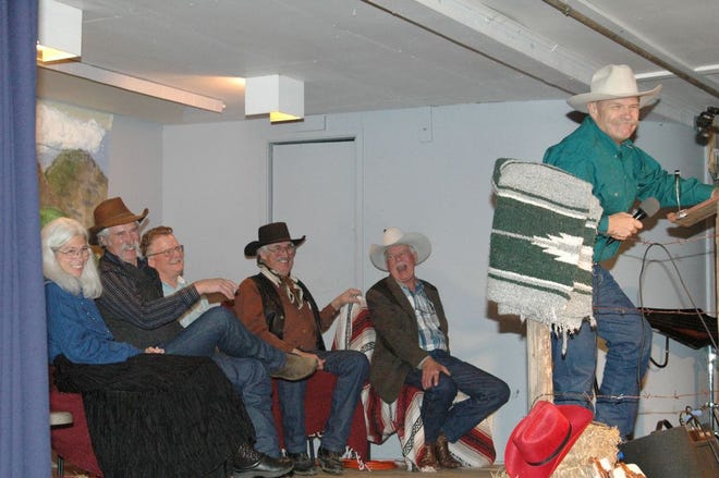 Butch Jones, right, engages the crowd with his own brand of cowboy entertainment. He and the poets behind him will perform at Fairchild Medical Center’s Evening of Cowboy Poetry and Music.