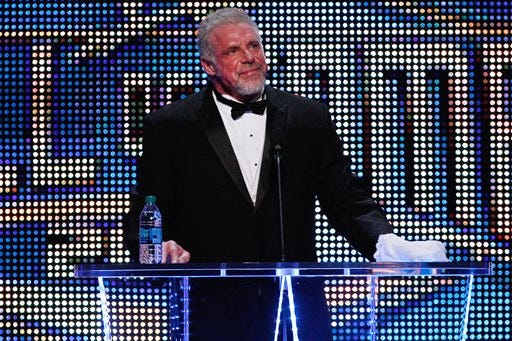 FILE - In this April 5, 2014 file photo provided by the WWE, James Hellwig, aka The Ultimate Warrior, speaks during the WWE Hall of Fame Induction at the Smoothie King Center in New Orleans. The WWE said Hellwig, one of pro wrestling's biggest stars in the late 1980s, died Tuesday, April 8, 2014. He was 54. (Jonathan Bachman/AP Images for WWE, File)