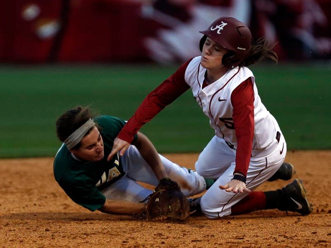 Alabama’s Chandler Dare, right, collides with UAB’s Caitlin Attfield at second base during Wednesday’s game.
