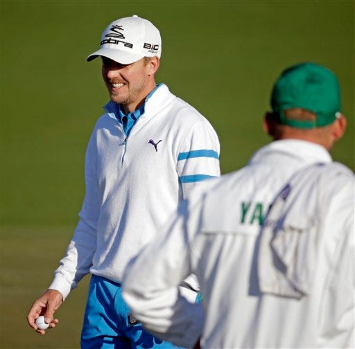 Jonas Blixt, of Sweden, walks off the seonc green after a birdie putt during the first round of the Masters golf tournament Thursday, April 10, 2014, in Augusta, Ga. (AP Photo/Chris Carlson)