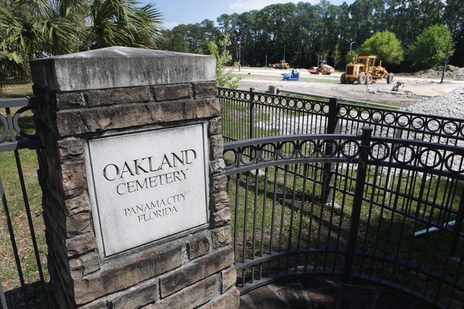 The new Panama City dog park can be seen from Oakland Cemetery’s western entrance.