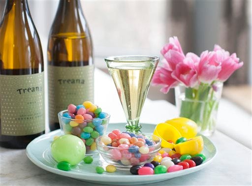 This March 31, 2014 photo shows a glass of Treana White and jelly beans in Concord, N.H. (AP Photo/Matthew Mead)