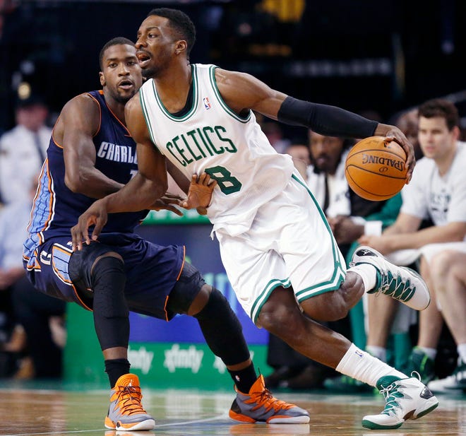 Jeff Green drives by Charlotte's Michael Kidd-Gilchrist on Friday night.